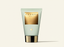 Tube of Canopy Beauty product on a light beige background