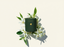Green candle box with floral arrangement on a light beige background
