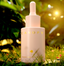 CANOPY botanical skincare bottle placed in nature with sunlight, symbolising active botanical ingredients.